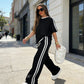 Conjunto de camiseta de rayas y pantalones anchos para mujer