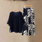 Set de Top Elegante y Fluido y Pantalones Estampados de Wemon