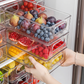 Caja organizadora transparente apilable para frigorífico con asas