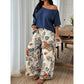 Conjunto de dos piezas para mujer: top con hombros al aire y pantalones estampados