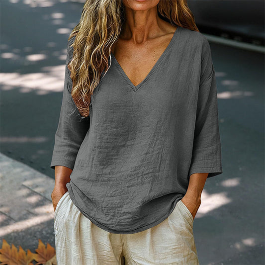 Blusa informal de mujer con cuello en V y mangas tres cuartos