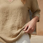 Blusa informal de mujer con cuello en V y mangas tres cuartos