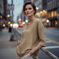 Blusa informal de mujer con cuello en V y mangas tres cuartos