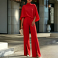 Conjunto de mujer compuesto por un top elegante con cuello alto tipo capa y pantalones de pierna ancha